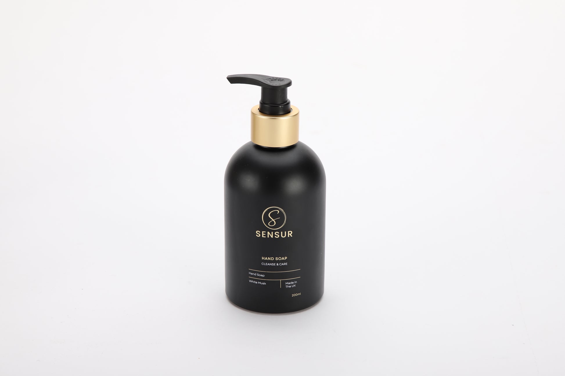 Black hand soap bottle with pump on a white background