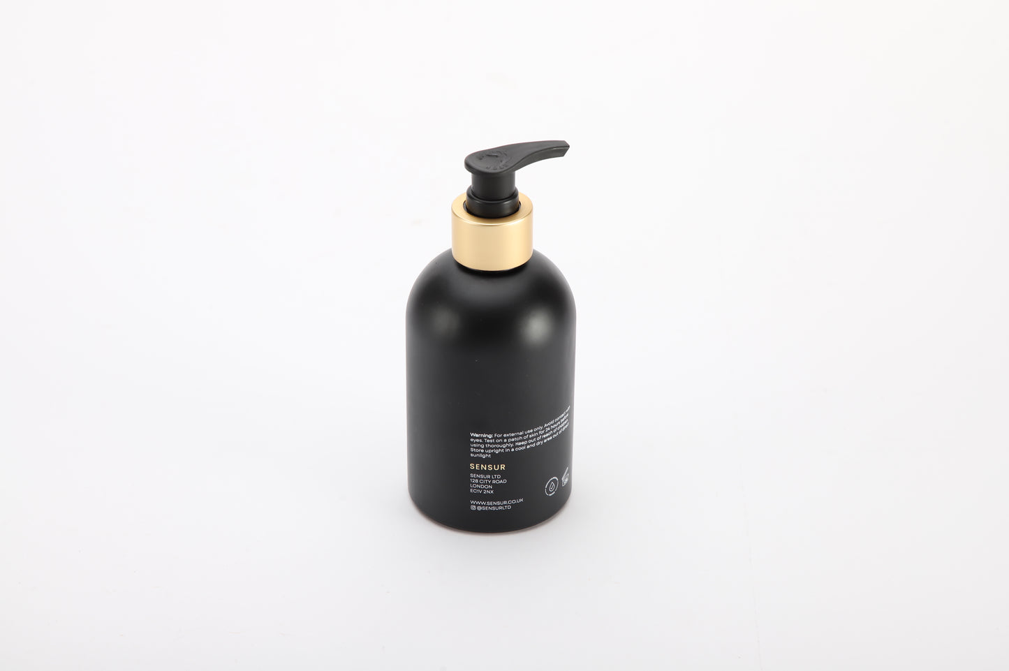 Black bottle with pump dispenser on a white background